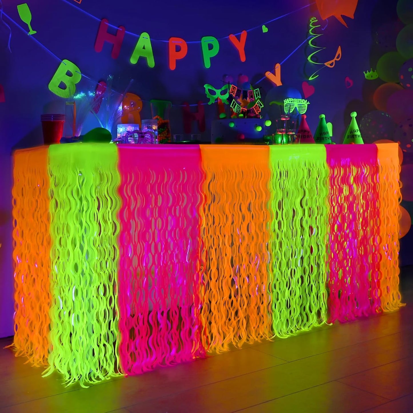 Mega-L Glow in The Dark Party Supplies, 4 Pack Neon Party Decorations Fluorescent Macaron Orange, Yellow and Fuchsia Wavy Metallic Tinsel Foil Fringe Table Skirts, Perfect Table Decors Glow Decors